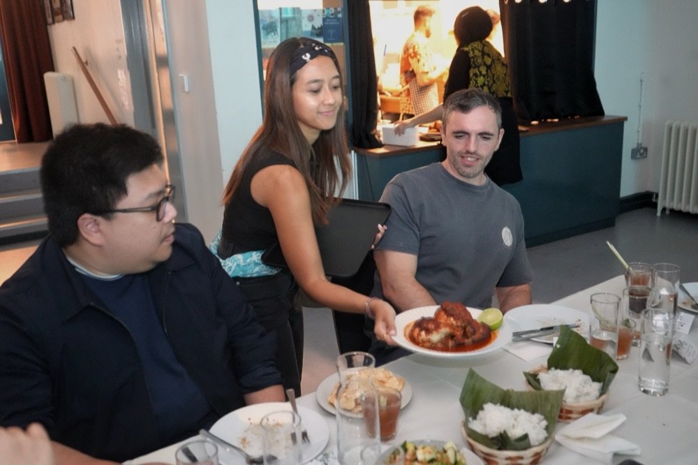 Guests toasting at a Jumpa Rasa supper club