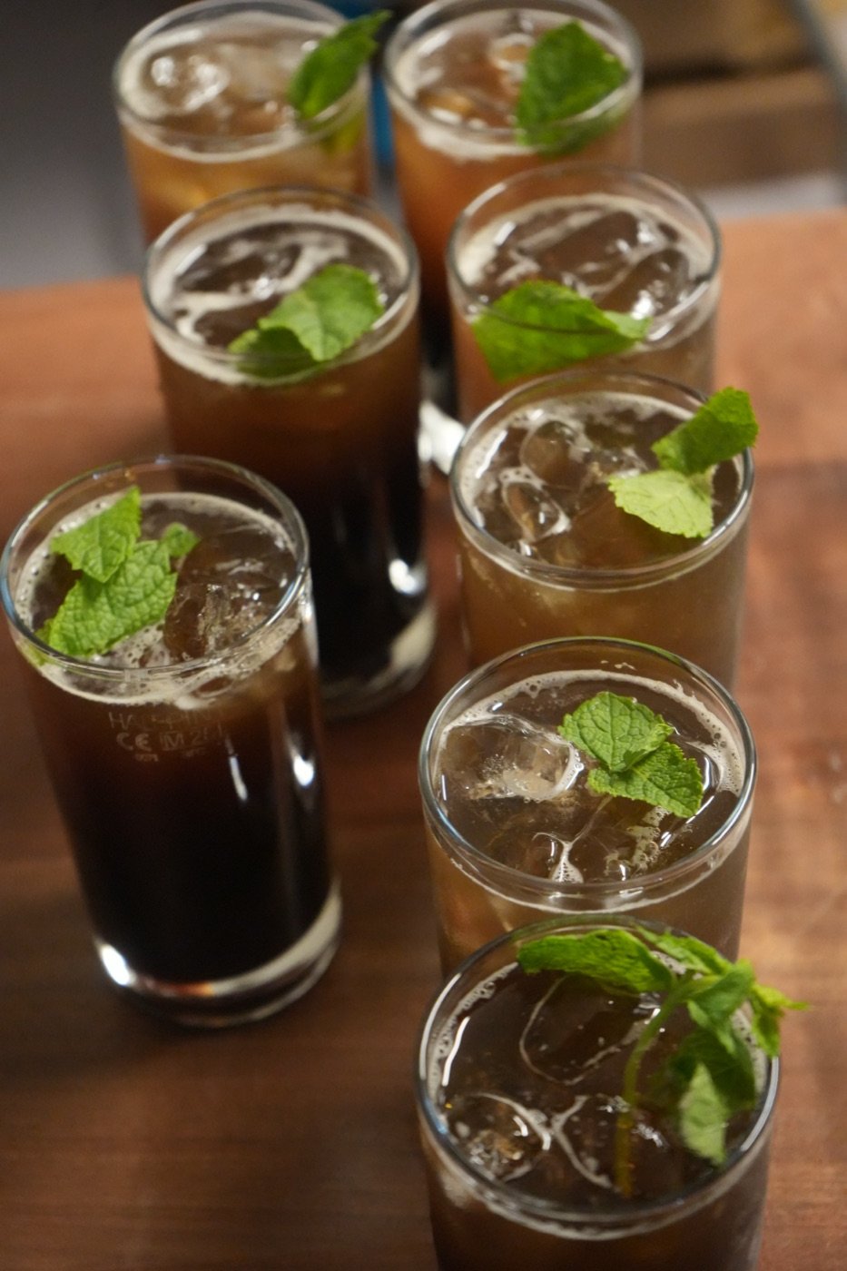 Tamarind Fizz mocktail garnished with fresh mint